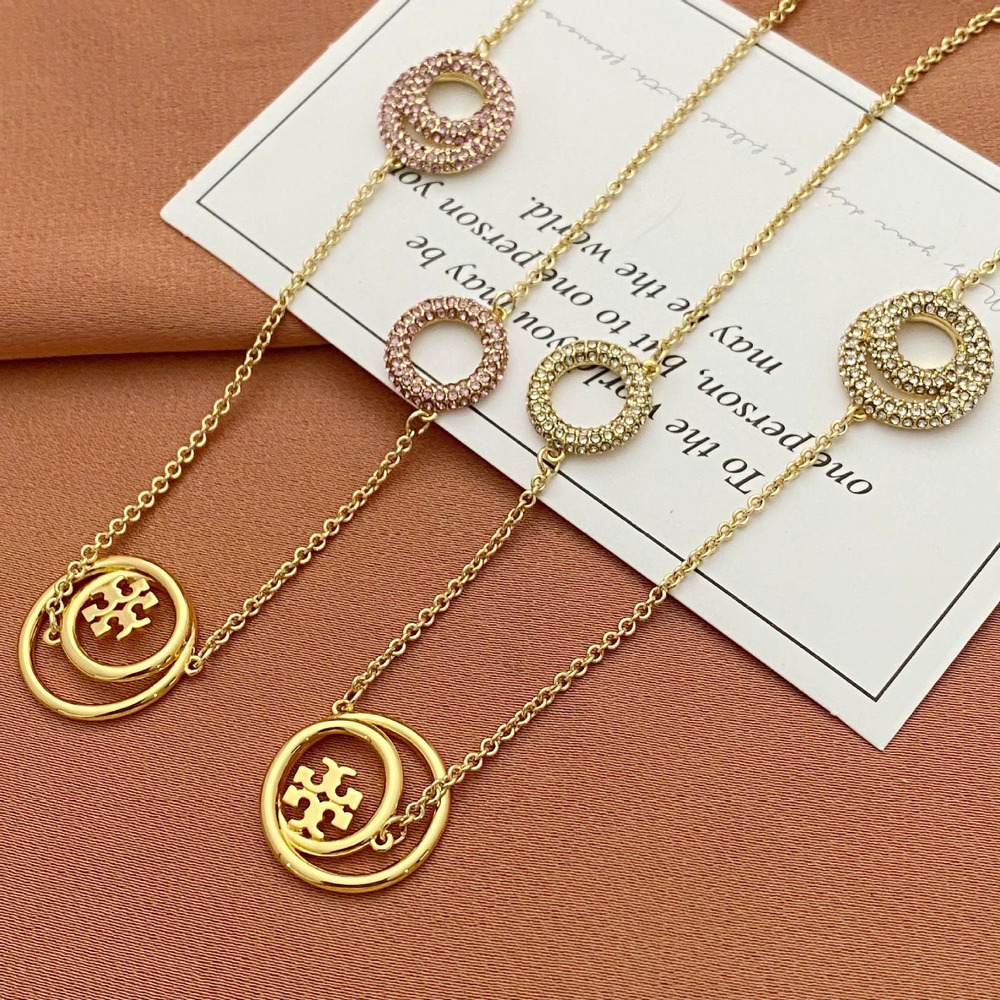 Tory Burch Rhinestone Letter Metal Necklace